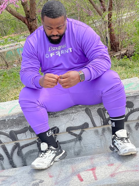 Man in purple tracksuit